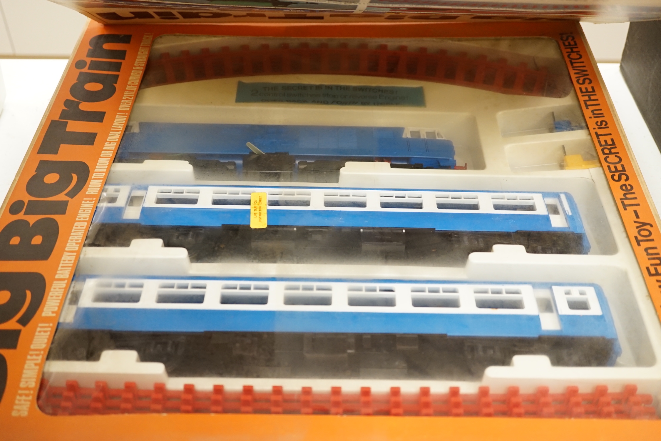 Three Tri-ang The Big Big Train 0 gauge train sets, all with a ‘Blue Flyer’ diesel locomotive and rolling stock, track sections, etc.